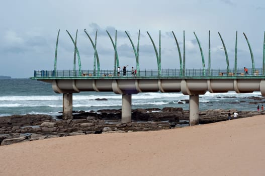 DURBAN, SOUTH AFRICA - JULY 09, 2016: People on the Millennium Pier at the beach in Umhlanga Rocks