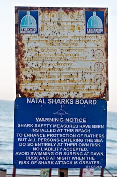 DURBAN, SOUTH AFRICA - JULY 13, 2016: Ethekwini Municipality notice and Natal Sharks Board Warning Notice on the promenade at Umhlanga Rocks