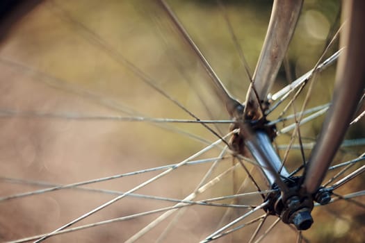 Abstract background with a forward wheel of the bicycle with bokeh