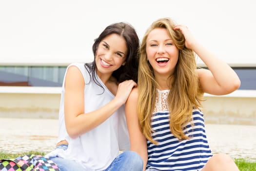 Happy teenage students in the school