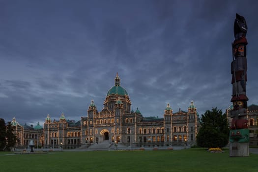 VICTORIA, BRITISH COLUMBIA, CANADA - MAY 26, 2011: Evening View of Government House and Totem in Victoria BC in Canada Using Long Exposure.