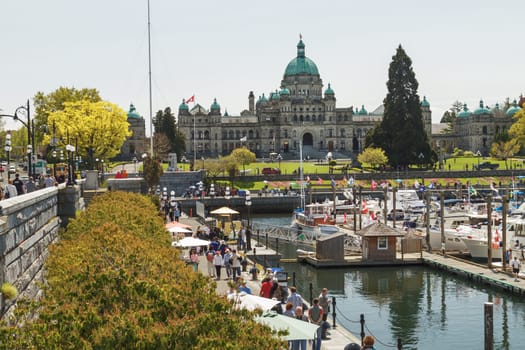 VICTORIA, BRITISH COLUMBIA, CANADA - MAY 19, 2011: People at Inner Harbour in Victoria, British Columbia, Canada