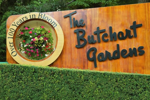 VICTORIA, BRITISH COLUMBIA, CANADA - AUGUST 11, 2011: The Sign of the Butchart Gardens in Victoria BC. Butchart Gardens is a Group of Floral Display Gardens and it Becomes National Historic Site of Canada.