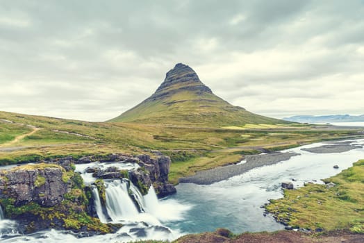 Beautiful Kirkjufell mountain, Snaefellsnes peninsula, Iceland, vintage effect, selective focus