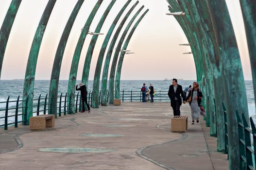 DURBAN, SOUTH AFRICA - JULY 11, 2016: Locals and tourists at the Millennium Pier in Umhlanga Rocks
