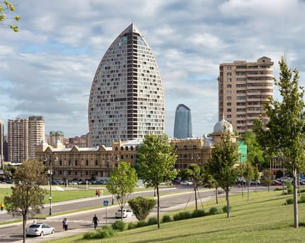 Baku, Azerbaijan - May 7, 2024: A panoramic vista of the city's skyline, prominently featuring the Ritz Carlton Hotel, underscores its distinctive architectural prowess