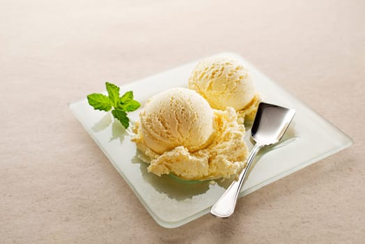 Fresh fruit sorbet ice cream in a white bowl close up