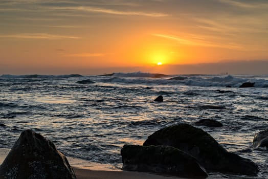 View of ships on the Indian Ocean from Umhlanga Rocks Beach at Sunrise