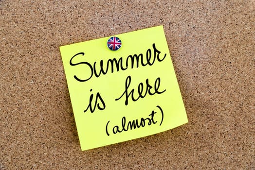 Yellow paper note pinned on cork board with Great Britain flag thumbtack, written text Summer Is Almost Here, British Business concept