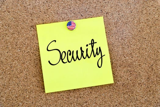 Written text Security over yellow paper note pinned on cork board