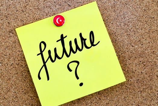 Written text Future ? over yellow paper note pinned on cork board and Turkey flag symbol