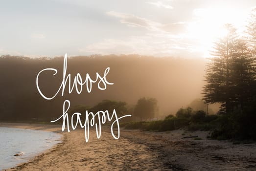 Choose Happy message. Handwritten motivational text over sunset calm sunny beach background with vintage filter applied