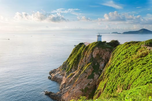 Hong Kong lighthouse during sunrise , Hok Tsui Cape D'Aguilar beautiful landscape