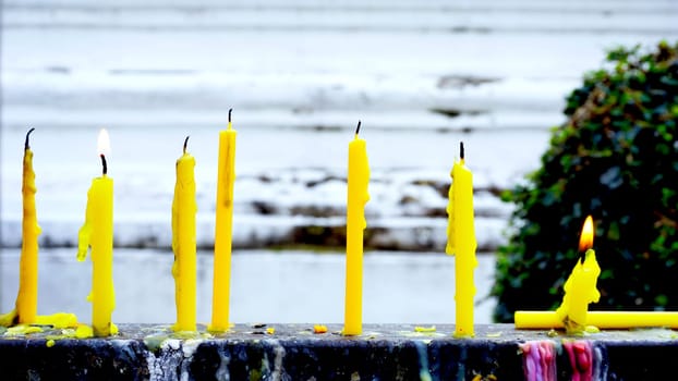 Candle light in the temple daytime, Thailand
