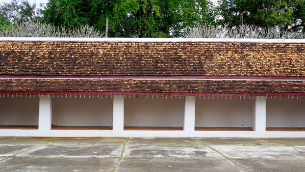 long Corridor and walkway with Layering of roof, Wat Chae Haeng, nan, Thailand