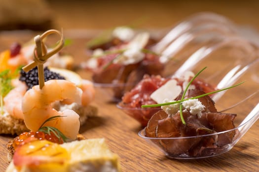 Exquisite selection of luxury canapes, appetizer ready to be served for events, celebrations or other occasion