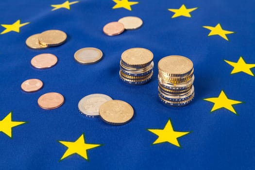 EU flag and Euro cash