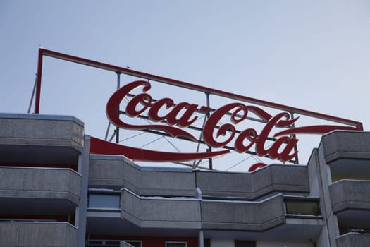 coca cola advertising on block of flats in berlin