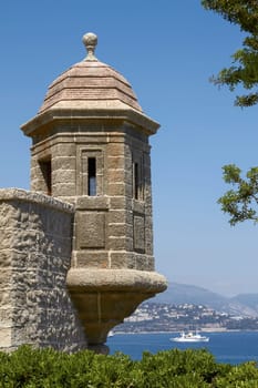 Monte Carlo Palace Wall with Watch Tower Overlooking the Mediterranean Ocean.
