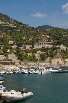 VILLEFRANCHE, FRANCE - JUNE 4, 2010: People Enjoying Luxury Bay and Resort of Cote d'Azur. Villefranche-sur-mer is Located on the French Riviera at Mediterranean Sea, near Nice. Cote d'Azur. France