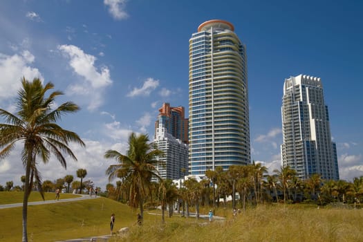 MIAMI, FLORIDA, USA - FEBRUARY 15, 2010: People Relaxing and Enjoying Sunny Day in Park Close to Miami Beach in Florida, United States.