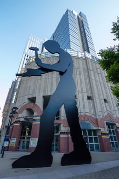 SEATTLE, WASHINGTON, USA - SEPTEMBER 9, 2011: Artwork of "The Hammering Man"" by Jonathan Borofsky, Stands Outside the Seattle Art Museum in Washington, United States."
