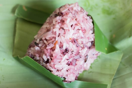 Cooked sticky rice-berry on banana leaf, stock photo