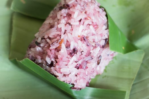 Cooked sticky rice-berry on banana leaf, stock photo