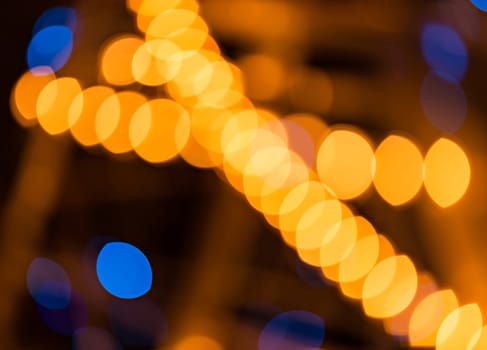 Abstract golden and blue background, circular bokeh, out of focus lights