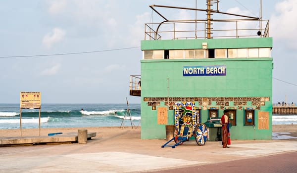 DURBAN, SOUTH AFRICA - AUGUST 17, 2015: Rikshaw at the North Beach lifesaver's station on The Golden Mile promenade