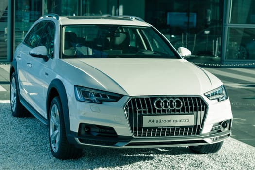 Munich, Germany - May 6, 2016: New contemporary A4 allroad quattro sports 4x4 SUV from Audi. Outdoor filtered and toned stock photo was captured in a public place with free access.