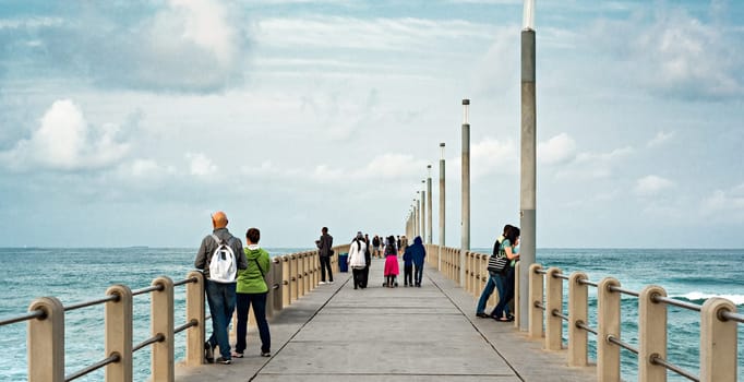 DURBAN, SOUTH AFRICA - AUGUST 17, 2015: People on the pier at North Beach Durban