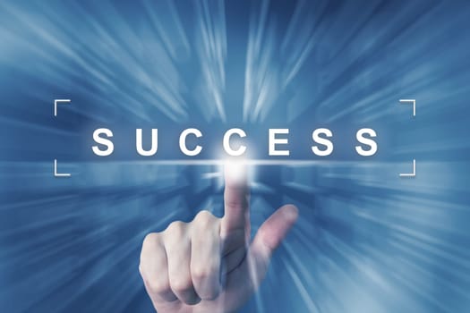 hand clicking on business success button with zoom effect background