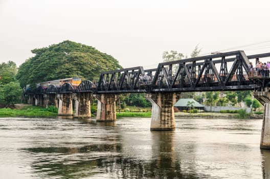 Trains for travel running on the old bridge over the River Kwai Yai is a historical attractions during World War 2 the famous of Kanchanaburi Province in Thailand