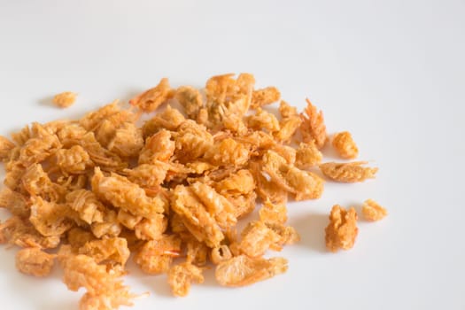 Fried crispy shrimp head on clean background