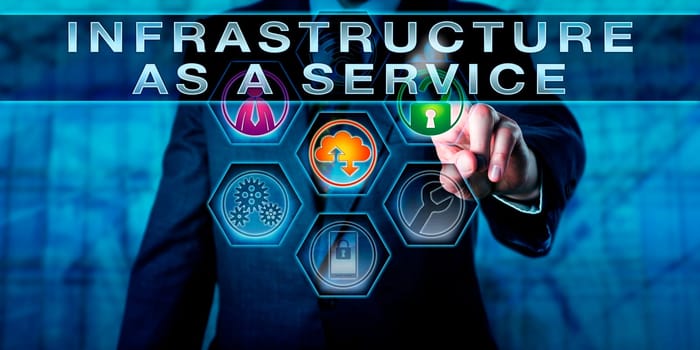Manager touching INFRASTRUCTURE AS A SERVICE on an interactive control monitor. Information technology metaphor. Cloud computing and cloud infrastructure concept. Close up torso shot of man in suit.