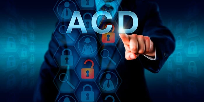 Cyber security manager is pressing ACD on a visual interactive screen. Information technology concept for Active Cyber Defense. A proactive form of computer security anticipating a network attack.