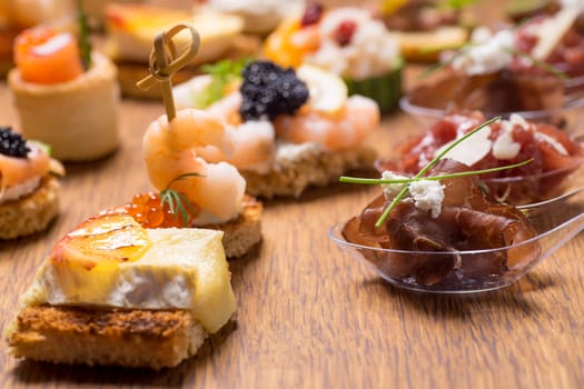 Exquisite selection of luxury canapes, appetizer ready to be served for events, celebrations or other occasion