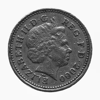 LONDON, ENGLAND, UK - NOVEMBER 23, 2013: HM The Queen Elizabeth II on One Pound coin from year 2000 isolated over white