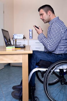 Wheelchair user does office work