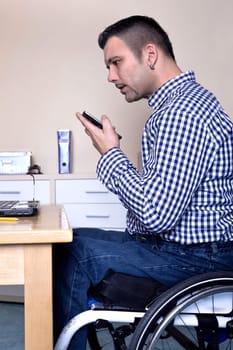 Wheelchair user does office work