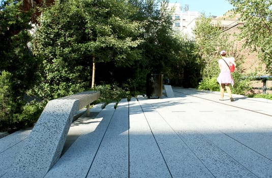 High Line. Elevated pedestrian Park and former elevated New York Central Railroad spur called the West Side Line, which runs along the lower west side of Manhattan  it has been redesigned and planted as an aerial greenway. New York City.