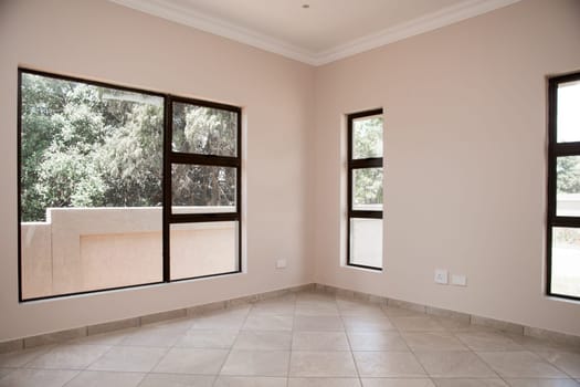 The empty enteriors of a newly build house which is up for sale.