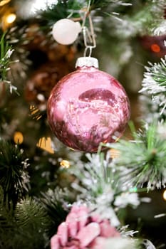 Christmas tree with beautiful toys photographed closeup