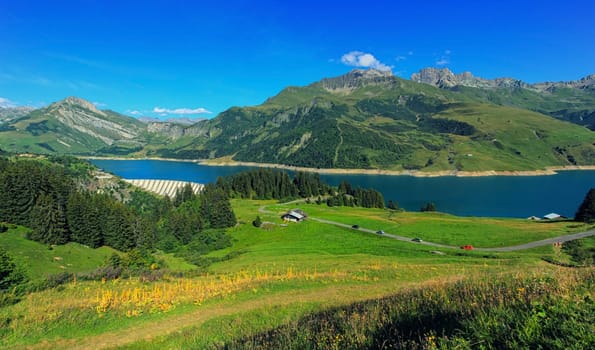 Roselend dam and Roselend lake by beautiful day in Savoie, France