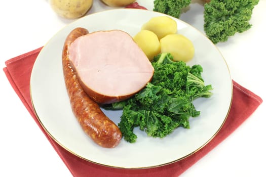 a plate with kale cassler and pinkel