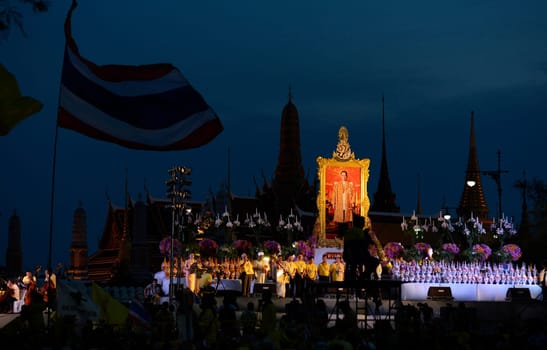 Tousends of Thai People at the ceremony of the coronation Day of the King Bhumibol on the Sanam Square Park on the 5. May in the city of Bangkok in Tahiland, Southeastasia.