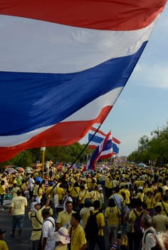 Tousends of Thai People at the ceremony of the coronation Day of the King Bhumibol on the Sanam Square Park on the 5. May in the city of Bangkok in Tahiland, Southeastasia.