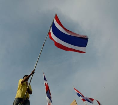 Tousends of Thai People at the ceremony of the coronation Day of the King Bhumibol on the Sanam Square Park on the 5. May in the city of Bangkok in Tahiland, Southeastasia.