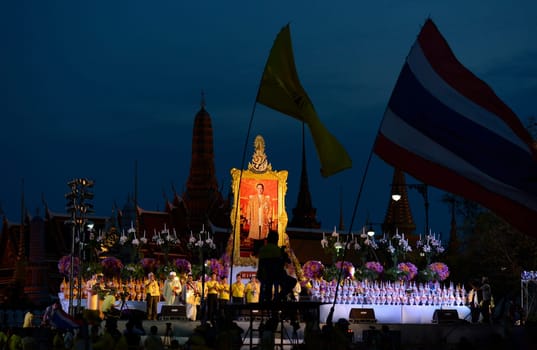 Tousends of Thai People at the ceremony of the coronation Day of the King Bhumibol on the Sanam Square Park on the 5. May in the city of Bangkok in Tahiland, Southeastasia.